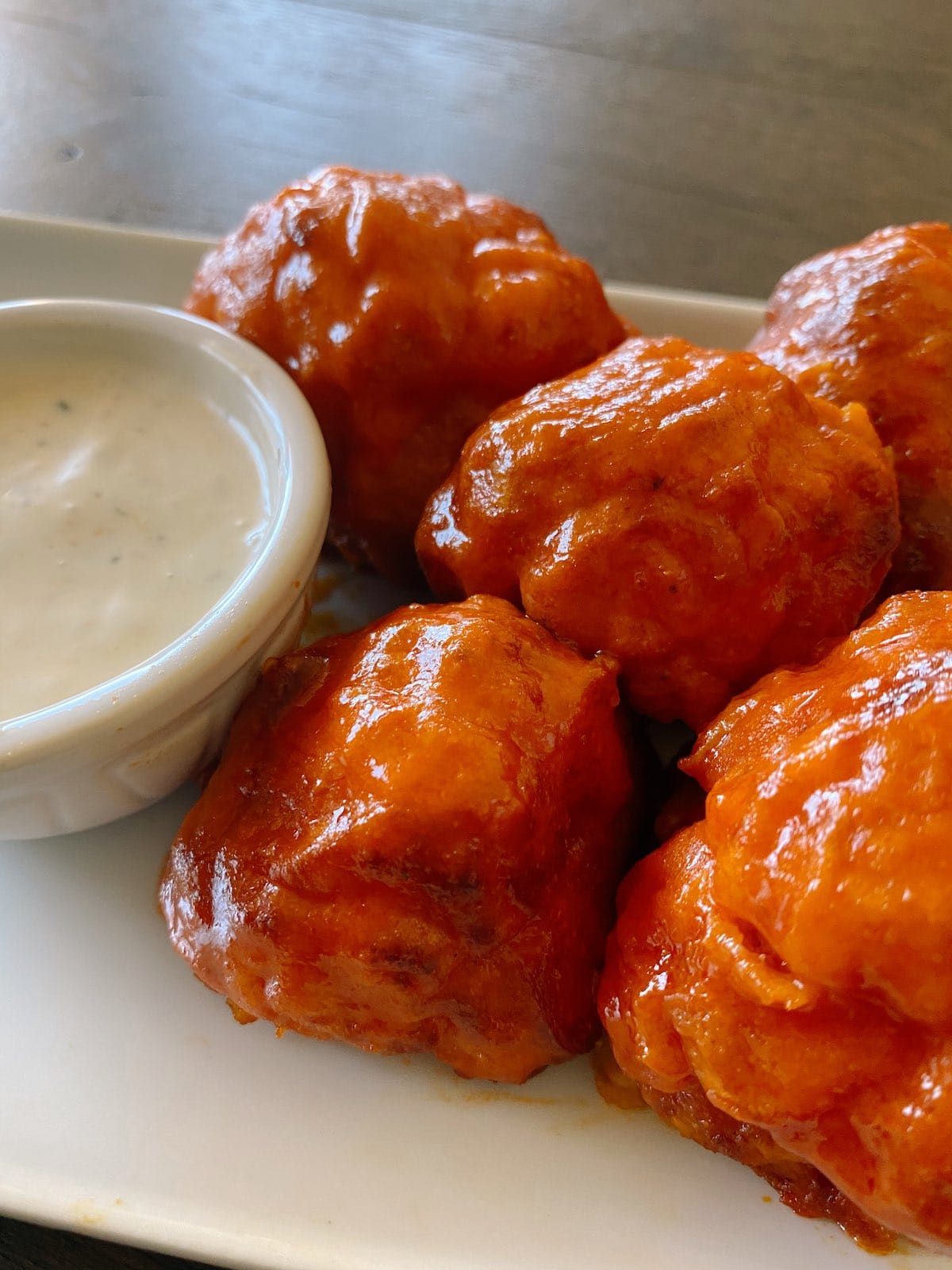 Air fried wings with ranch dipping sauce.