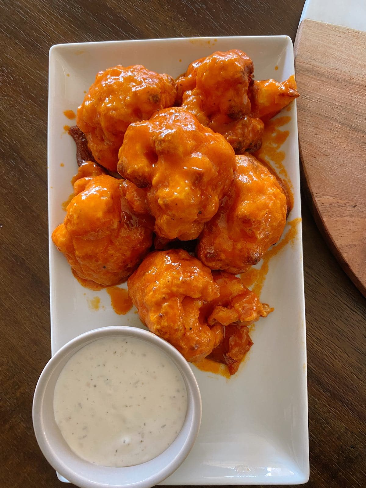 Buffalo cauliflower wings on a plate.