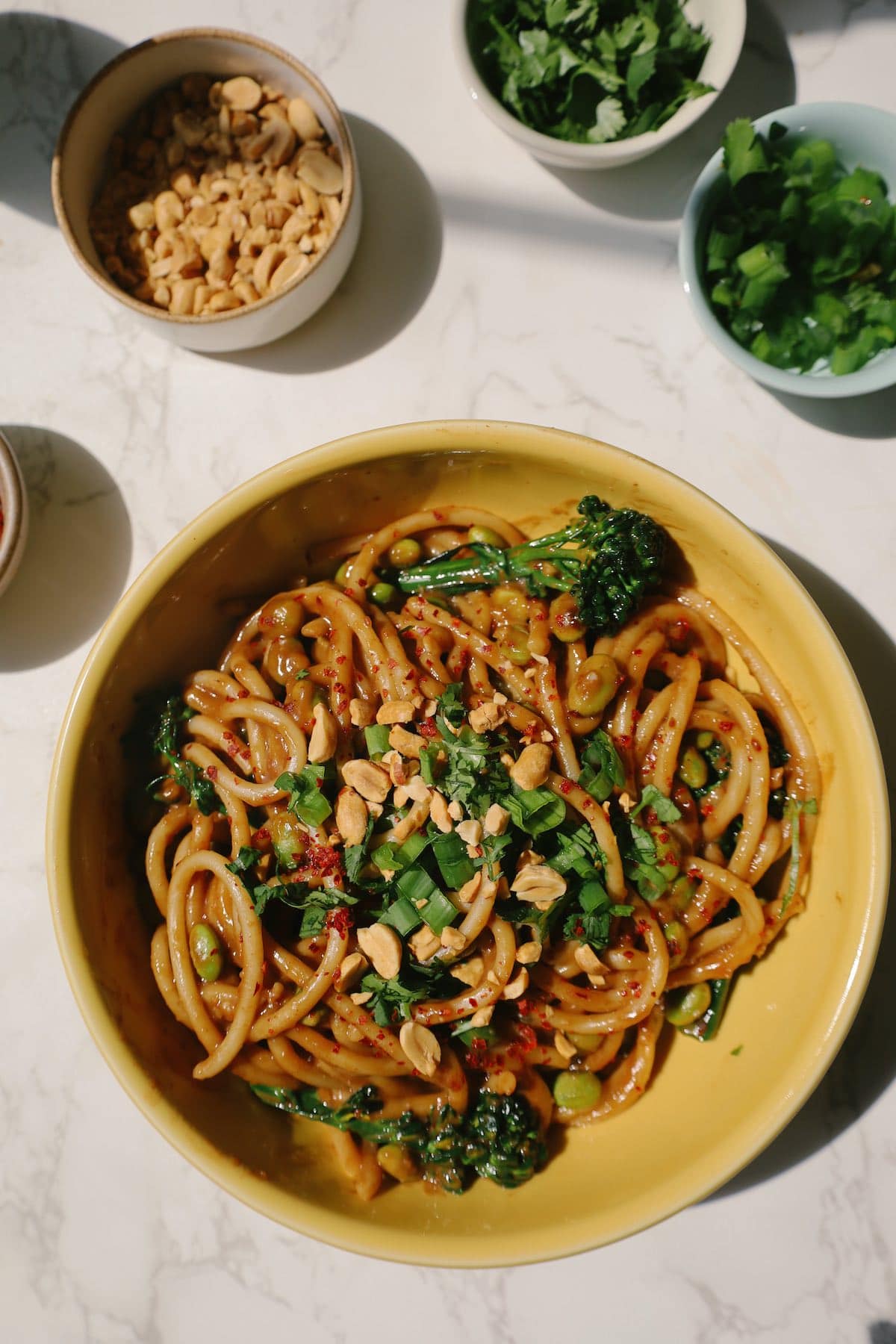 Spicy peanut noodles in a bowl.