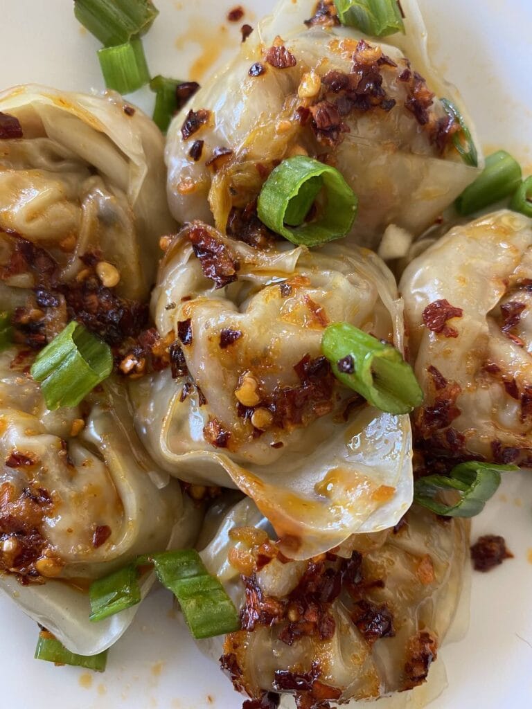 Chili oil dumplings close up