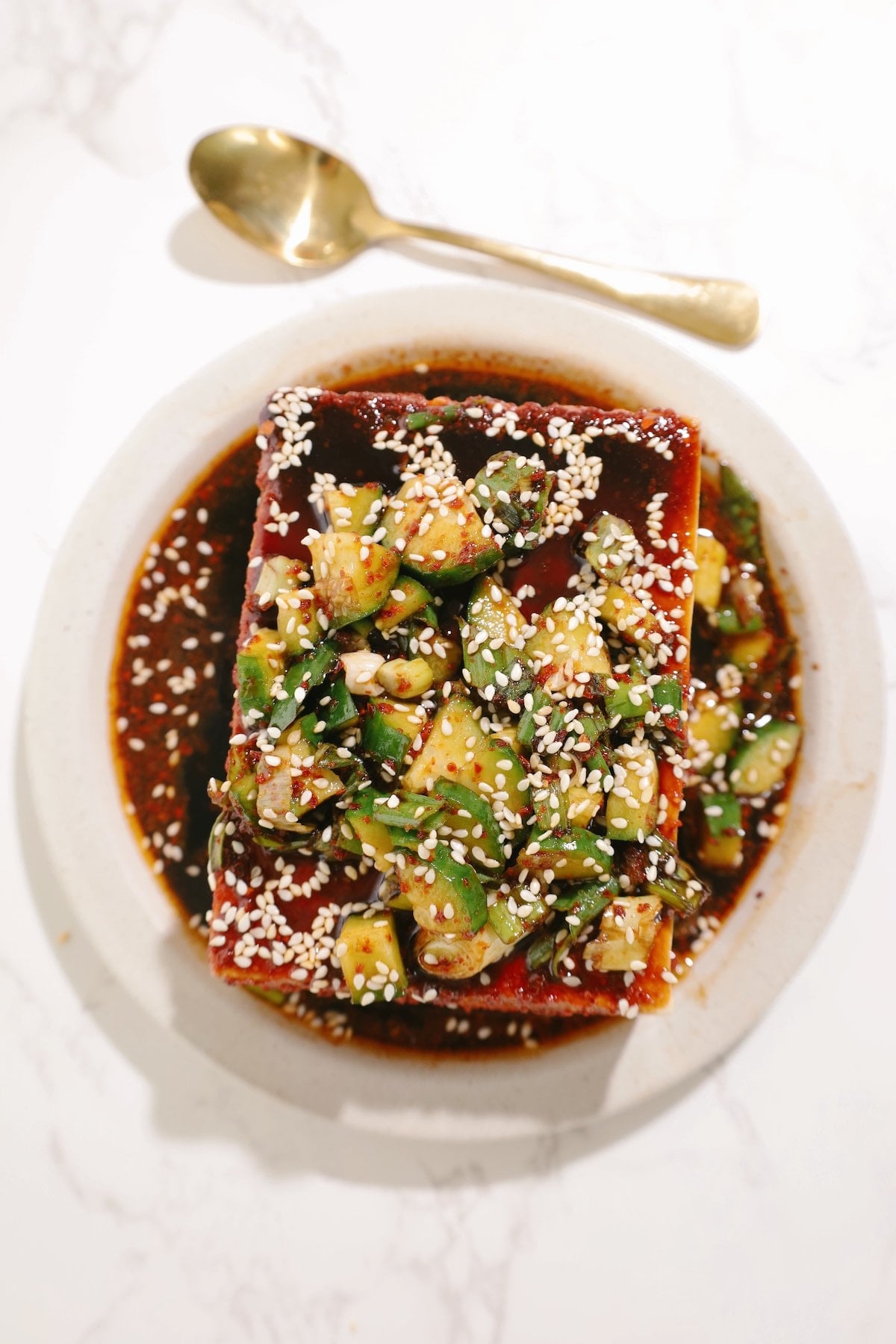 Classic cold silken tofu recipe on a plate.