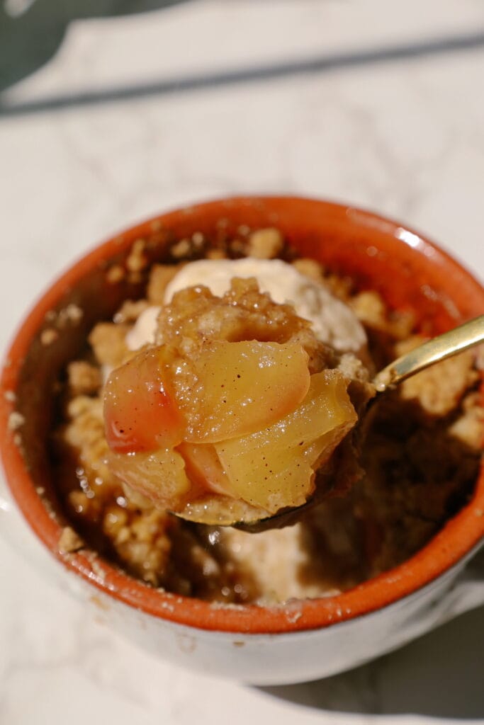 single serving apple crumble recipe served with ice cream