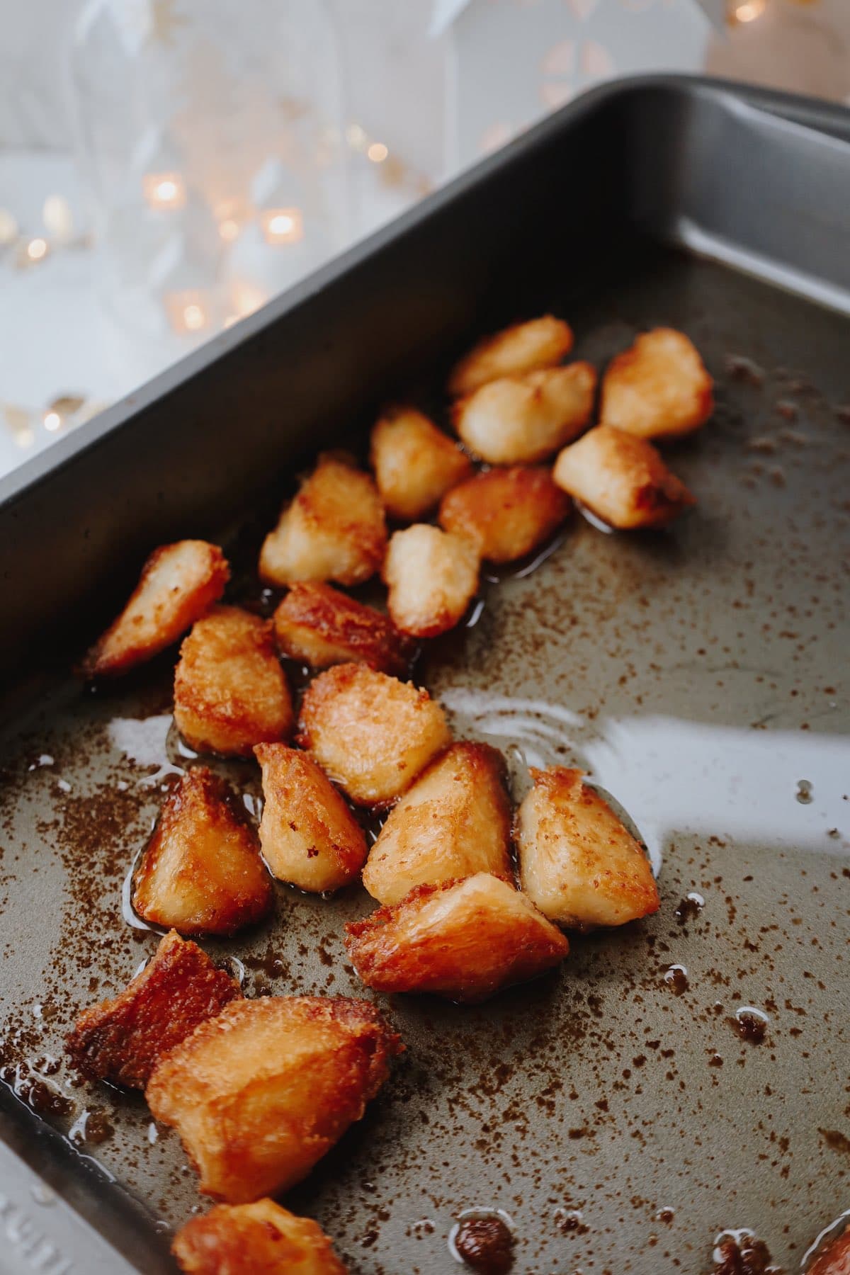 crispy oven roasted potatoes in a baking sheet