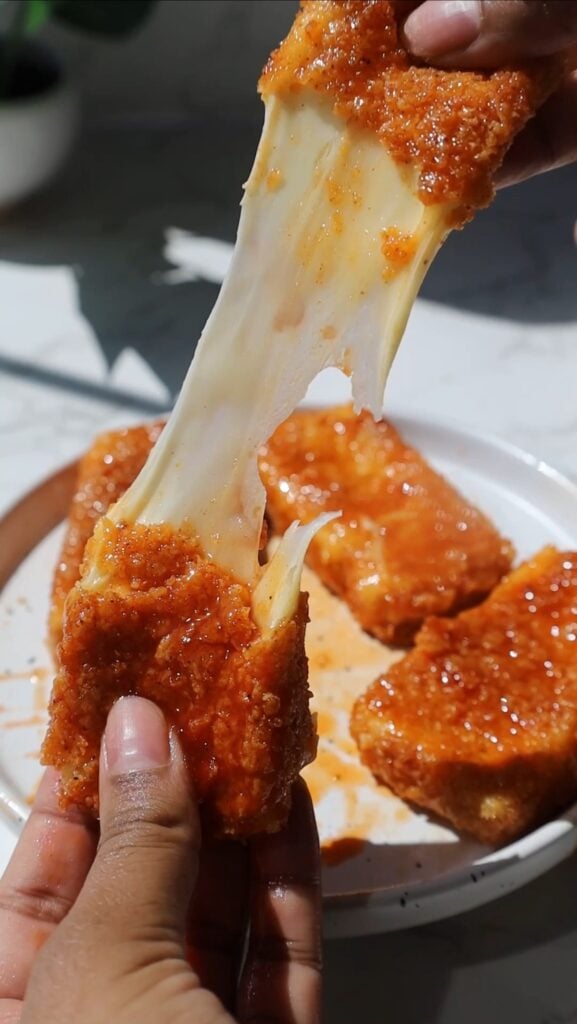 hot honey mozzarella sticks cheese pull