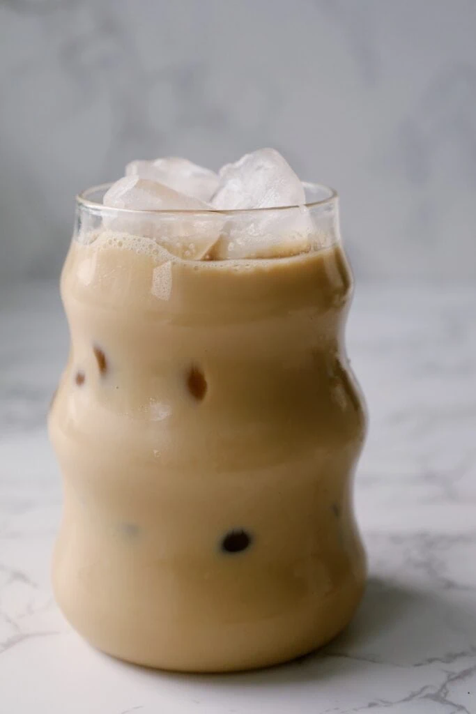 iced chai latte in glass
