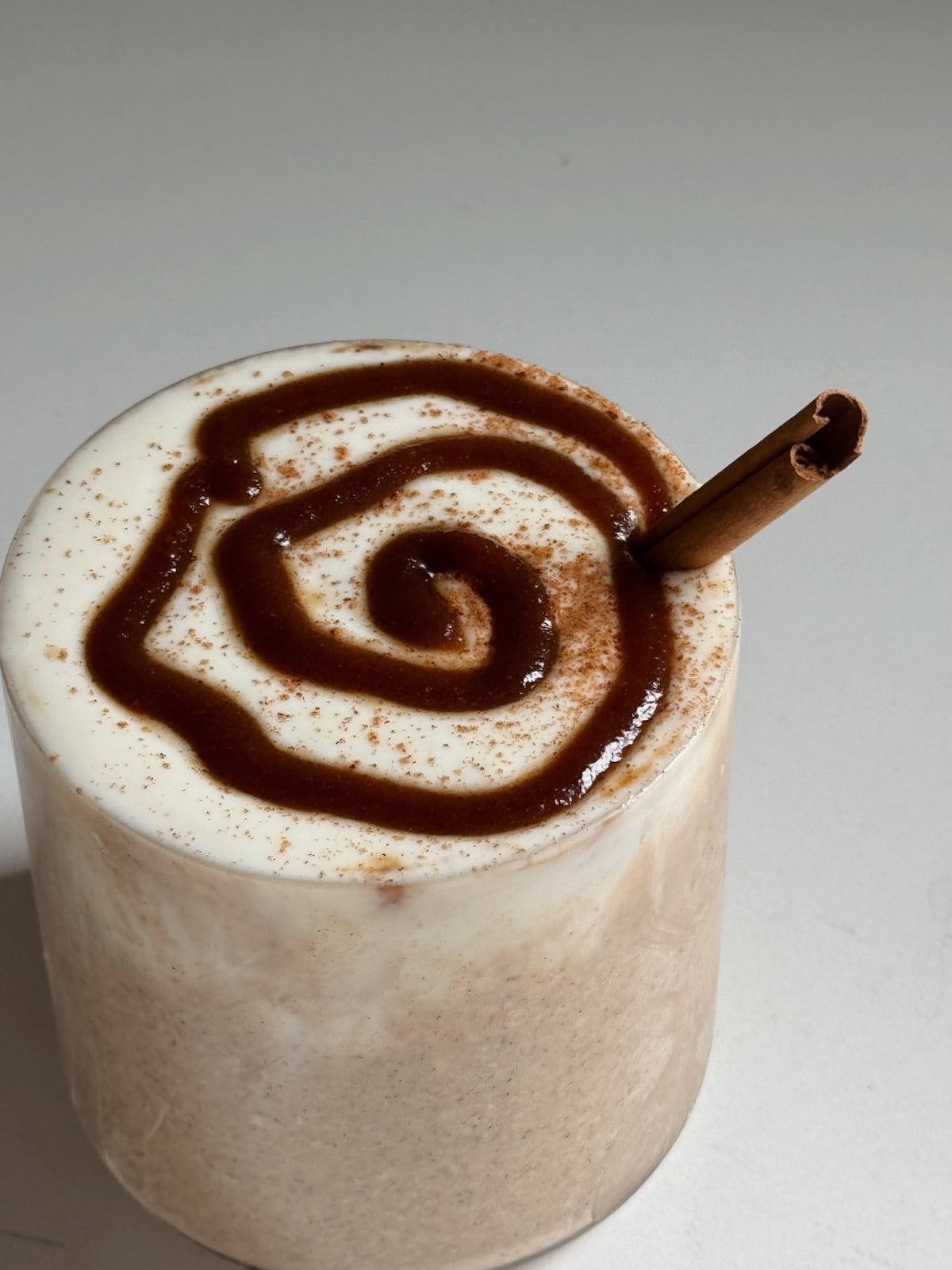 Cinnamon roll overnight oats with a brown sugar swirl on top.