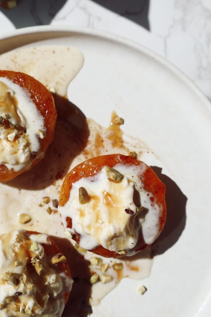 air fryer peaches with pistachios on top