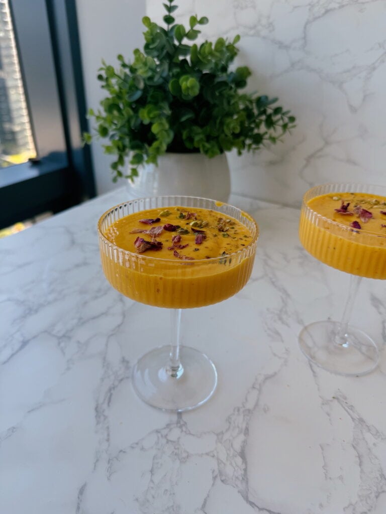 mango lassi recipe garnished with rose petals