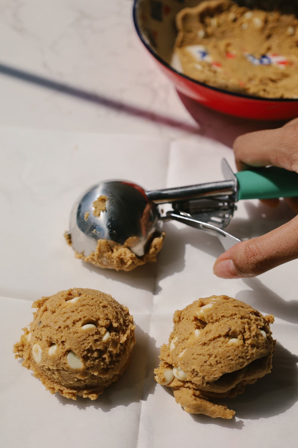 scooping out the cookie dough