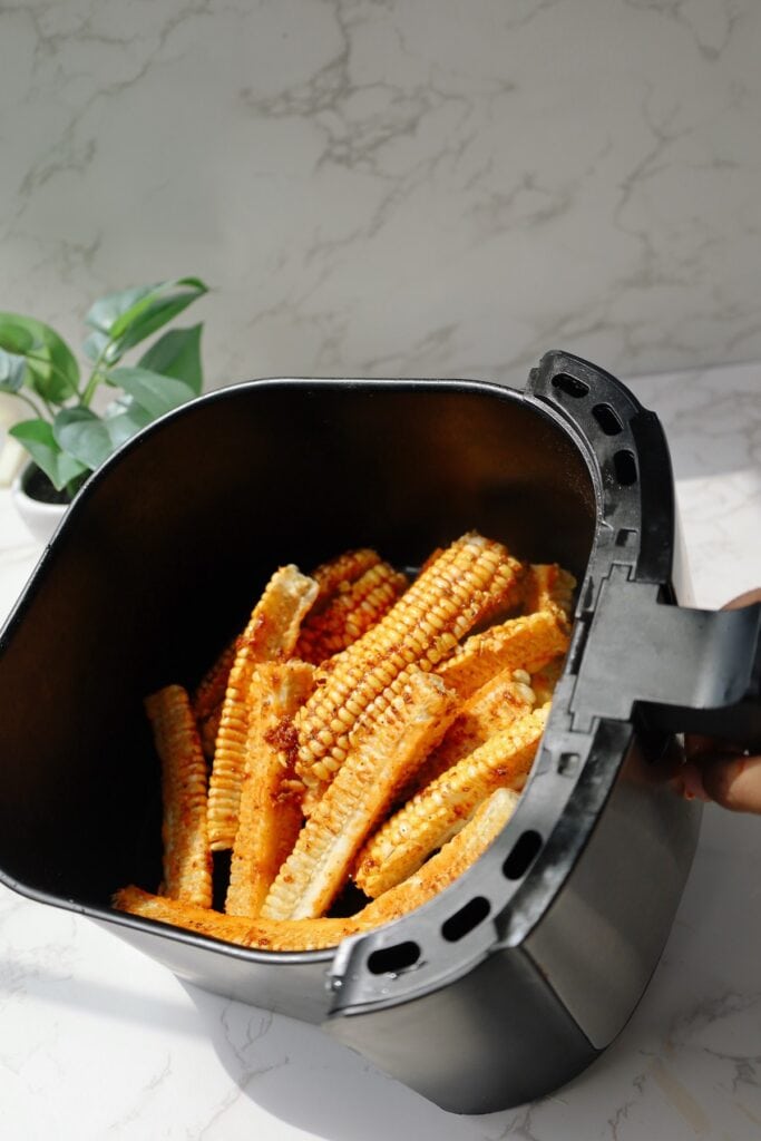 Step Four: put the corn ribs in the air fryer.