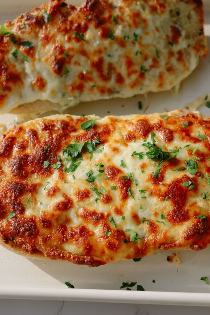 close up image of cheesy garlic bread