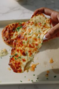 serve cheesy garlic bread