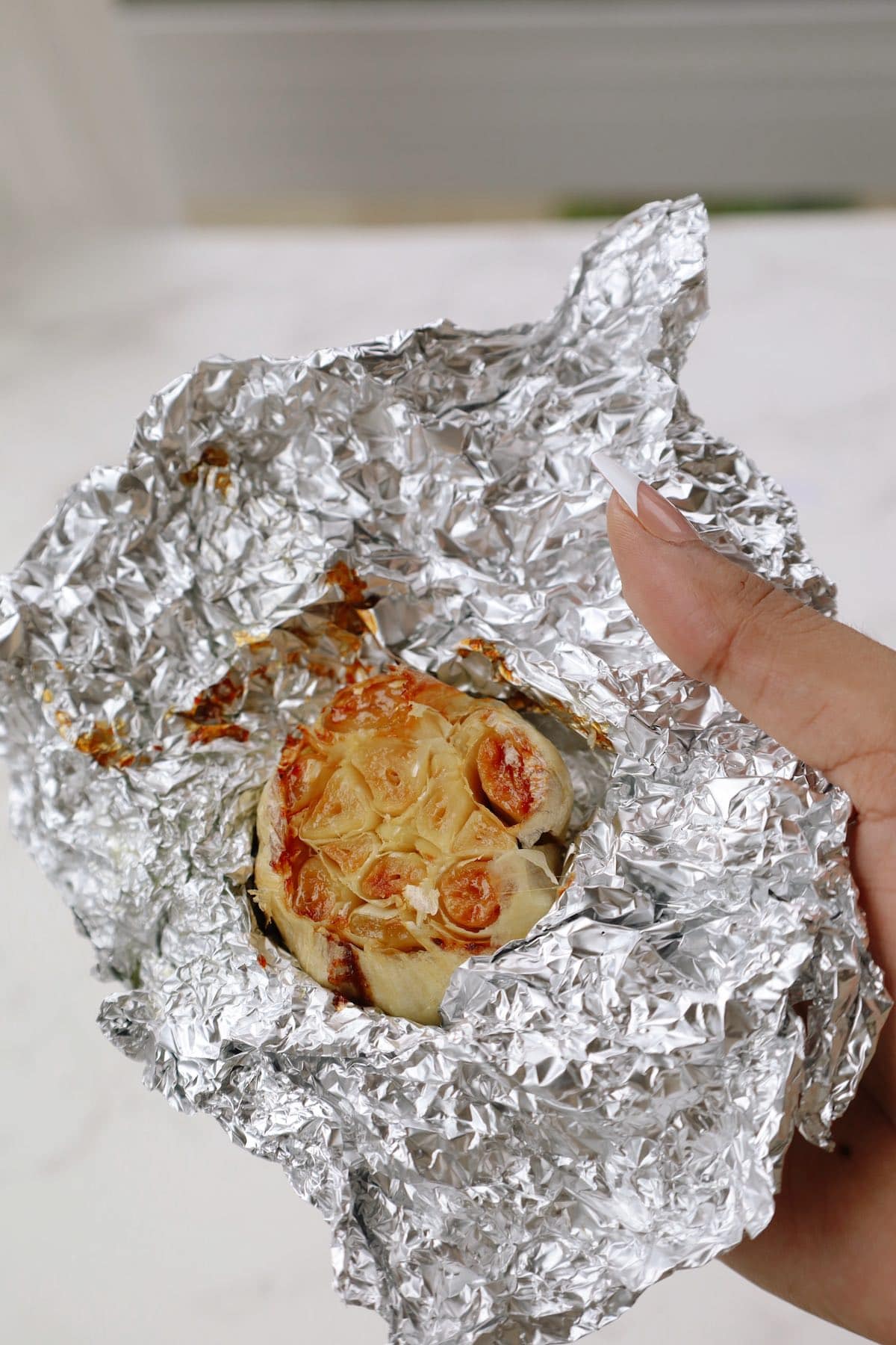 Garlic mashed potato recipe step one: roast the garlic.