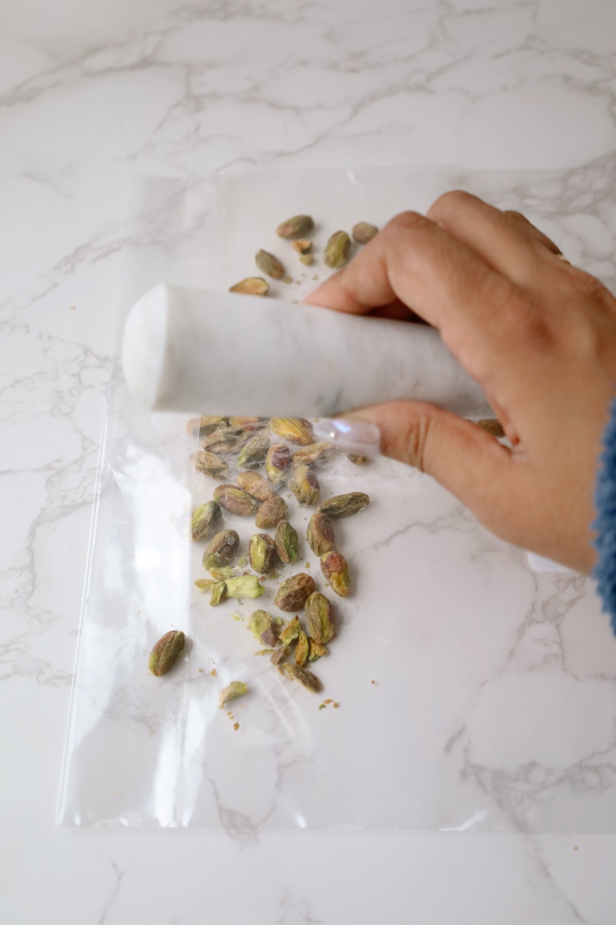 Step one: crush the pistachios.
