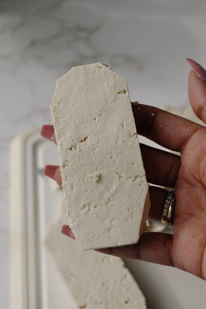 step one - cut the corners off of the tofu.