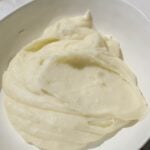 Creamy mashed potatoes in a large plate.