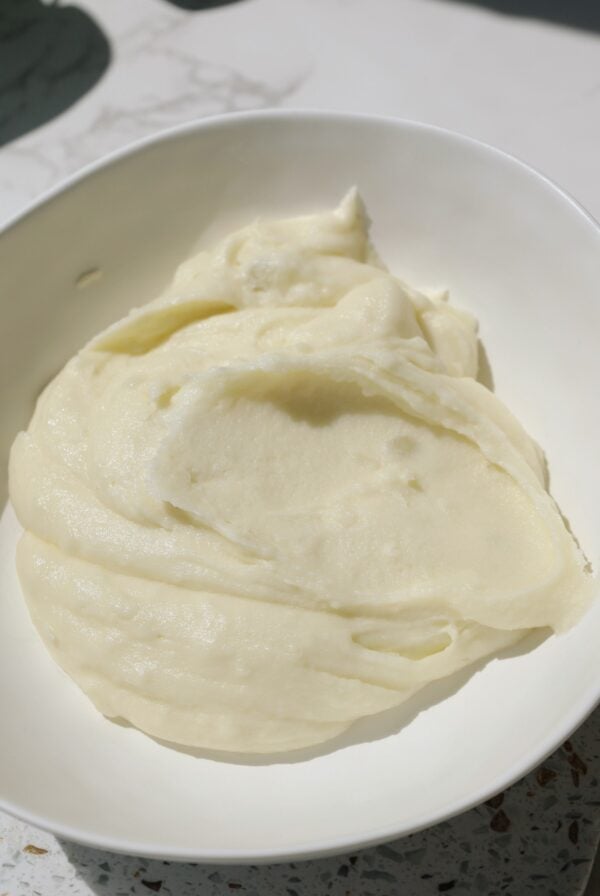 Creamy mashed potatoes in a large plate.