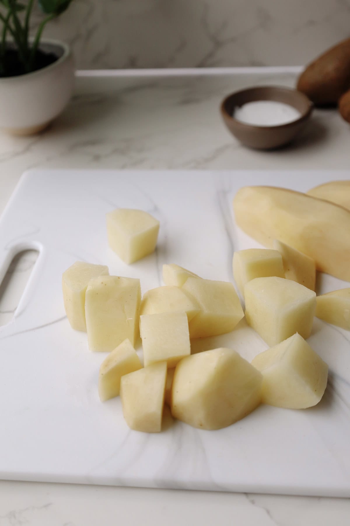 Step One: peel and chop the potatoes.