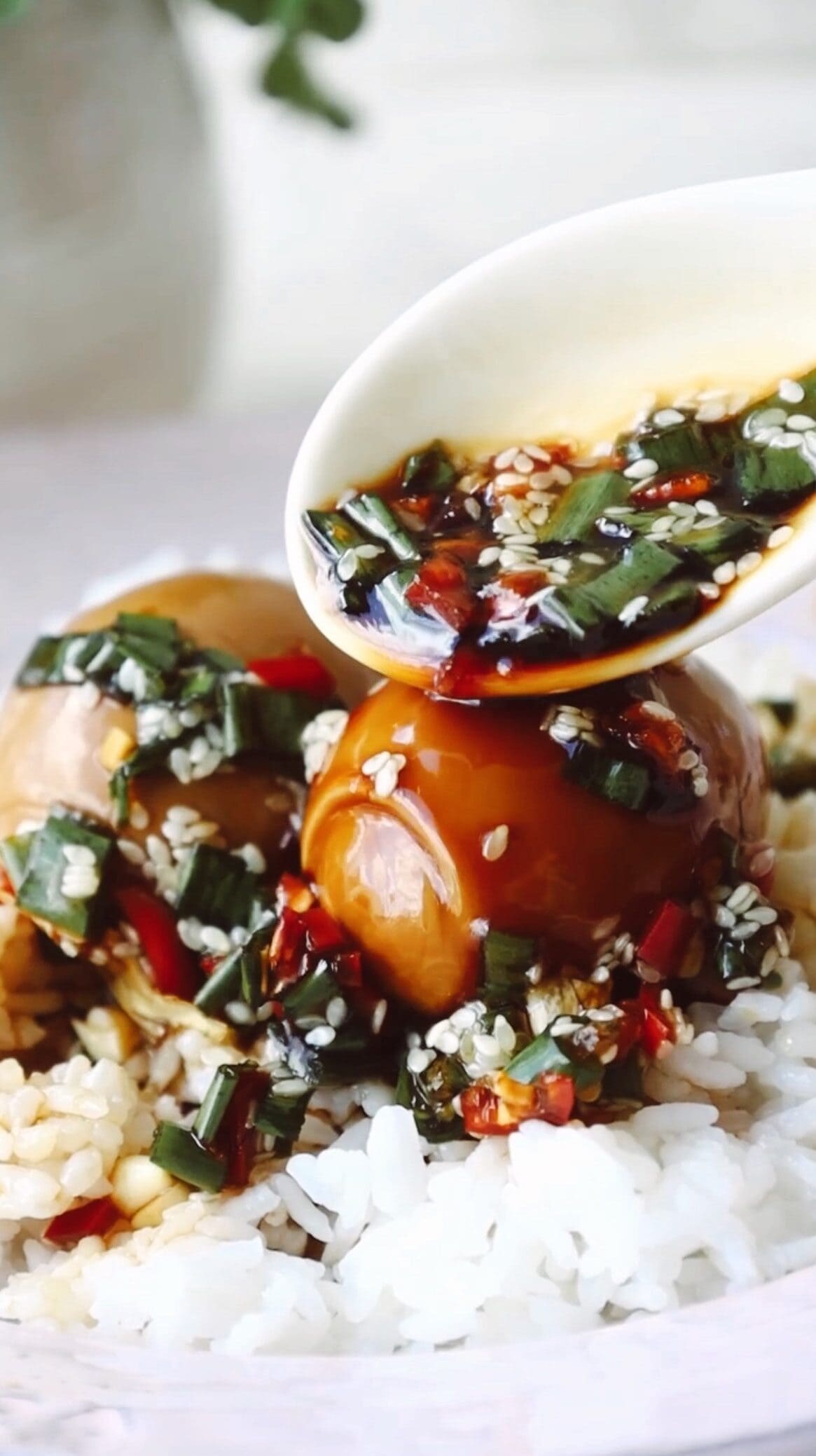 Mayak eggs with marinade poured on top.