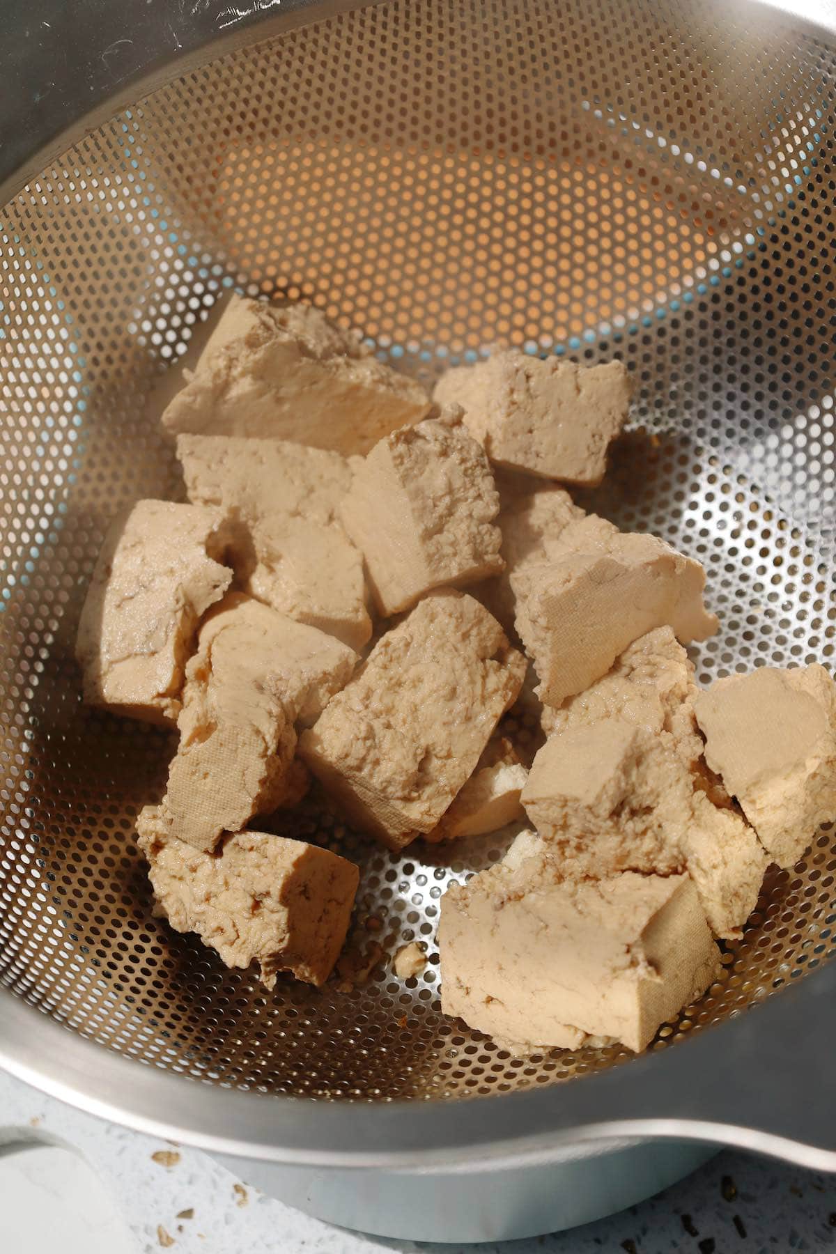 Vegan chicken nuggets step three: drain and cool.