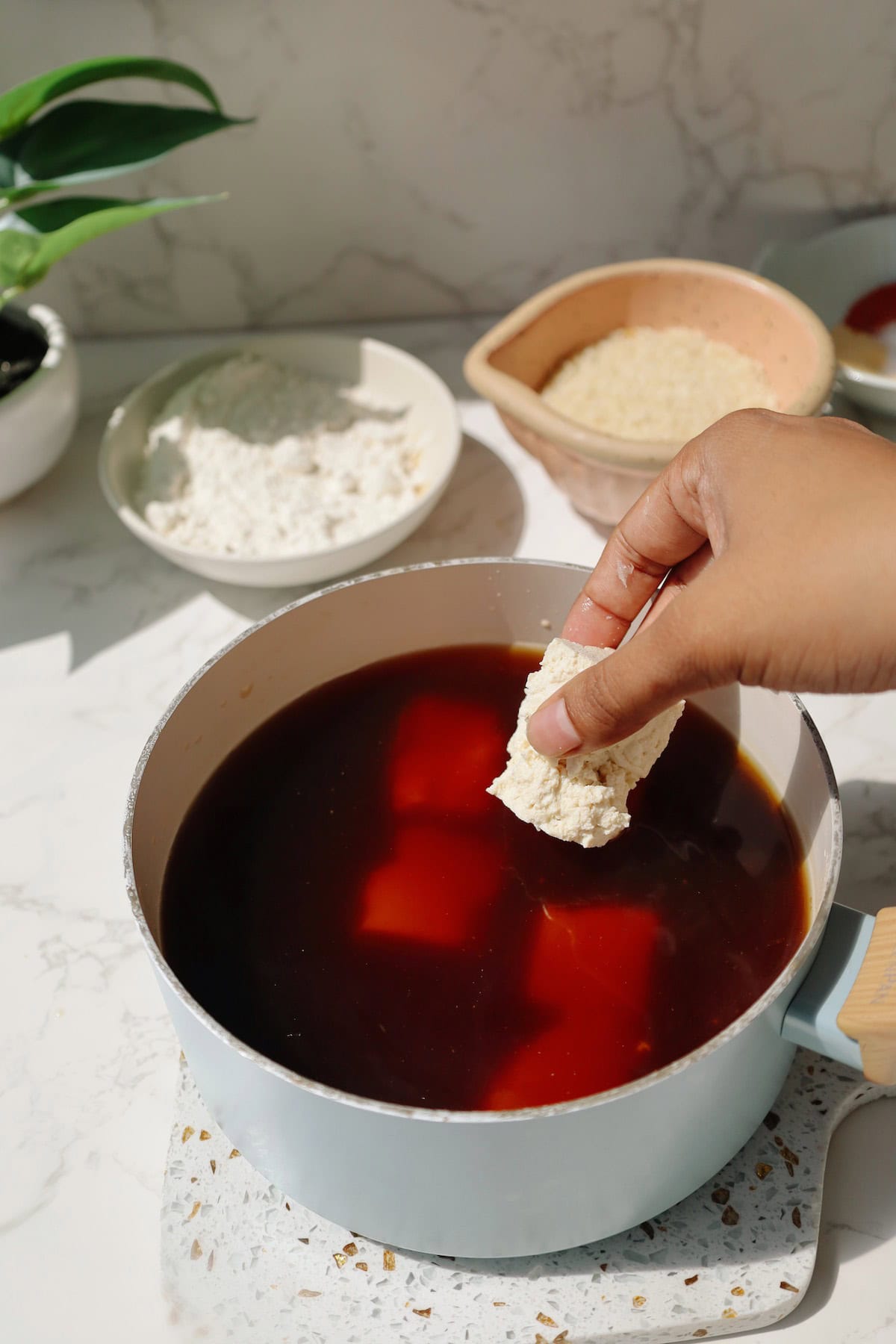 Vegan chicken nuggets step two: boil the tofu.