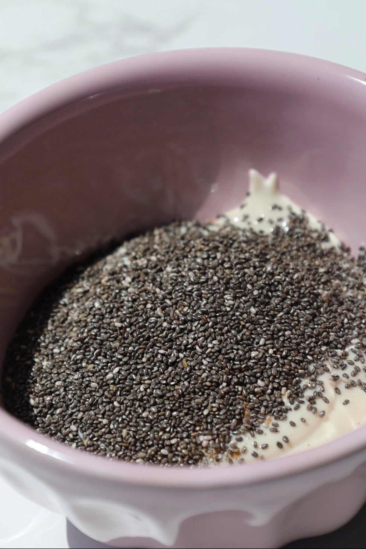 A bowl filled with chia seeds.