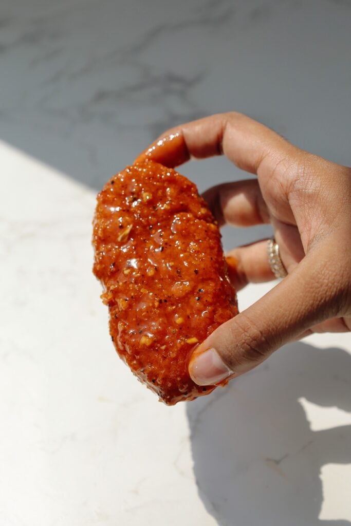 Vegan chicken tender with lemon pepper sauce.