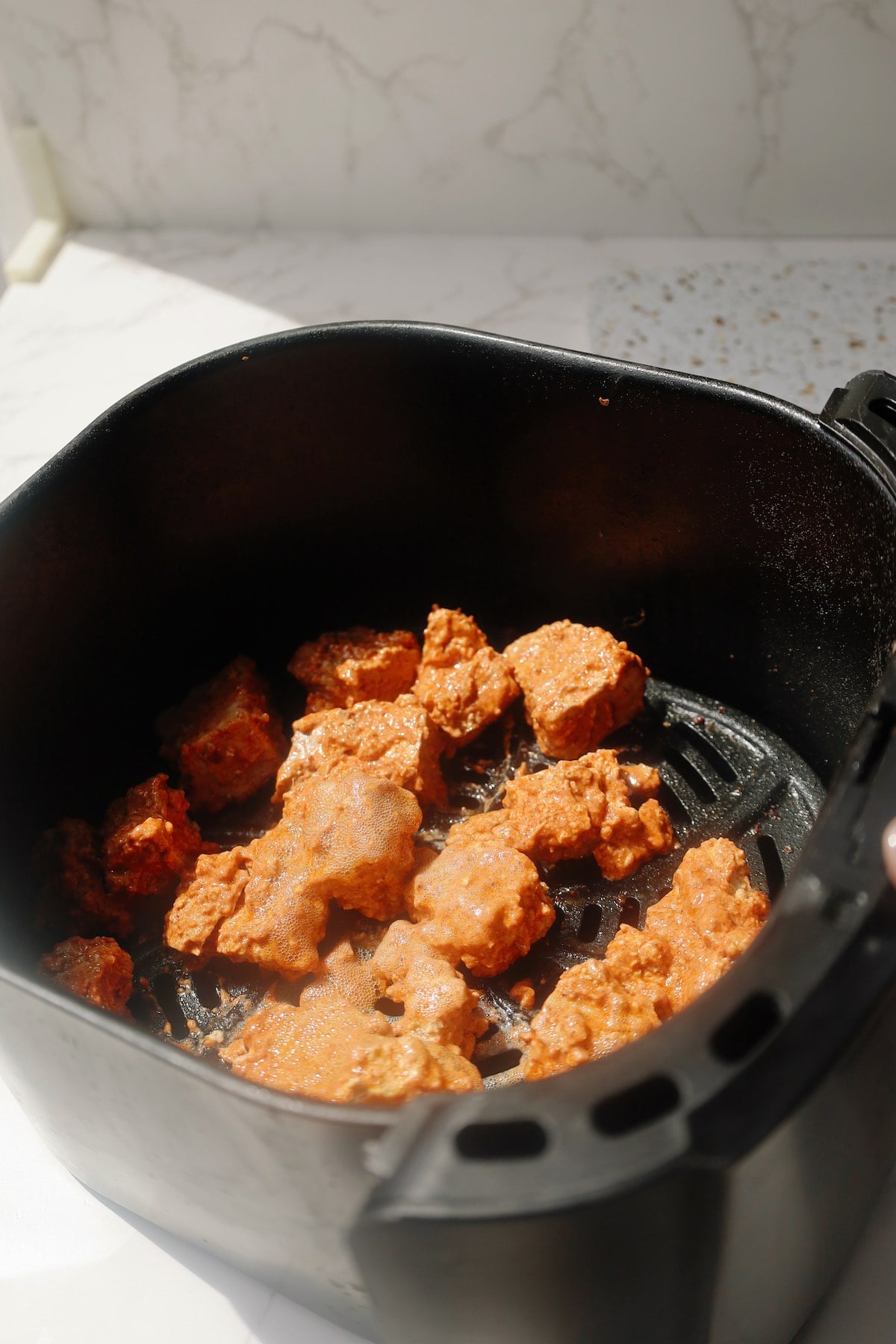 Vegan shawarma step four: coat the tofu.