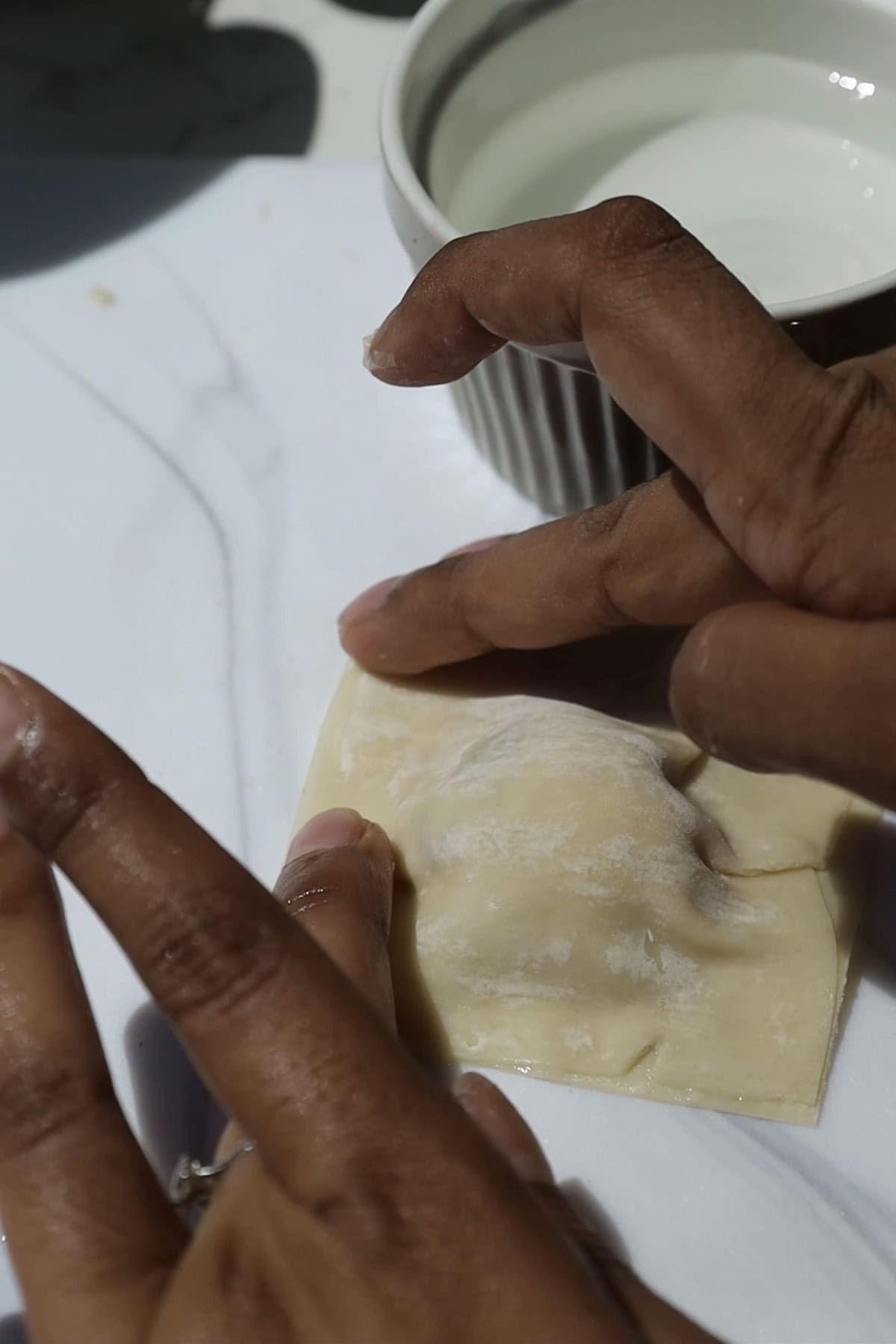 Step five: seal the wontons.