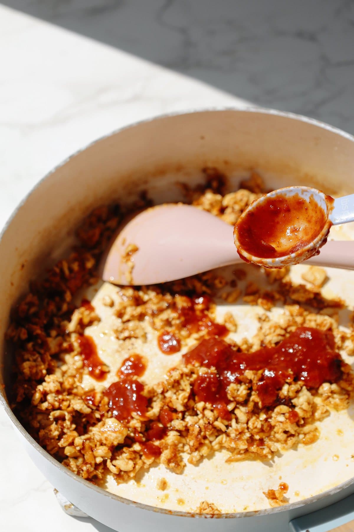 Step three: add the chipotle sauce.